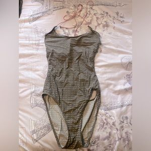 Calvin Klein Brown once piece swimsuit, white polka dots with pink string